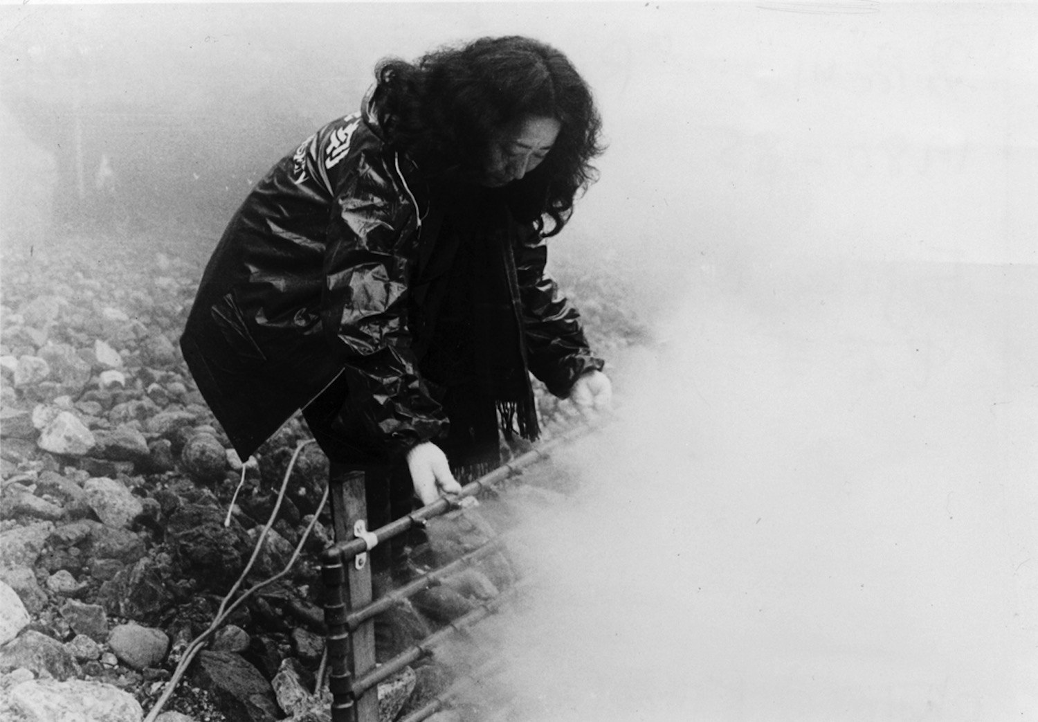 Fujiko Nakaya with fog nozzles, Ojika River, Japan, collaboration with Bill Viola, 1980